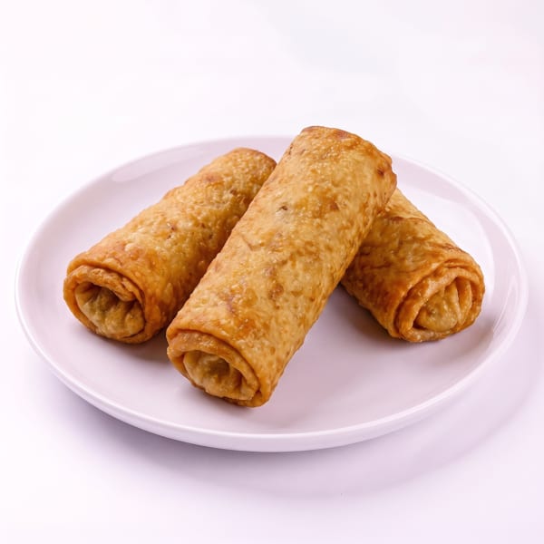 Three golden-brown fried spring rolls are arranged on a white plate against a white background.